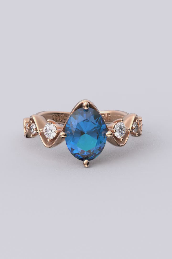 Anello di fidanzamento con topazio blu di Londra e diamanti